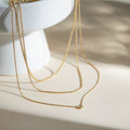 Collar triple caída