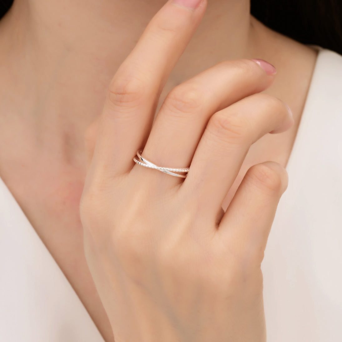 Anillo doble cruzado